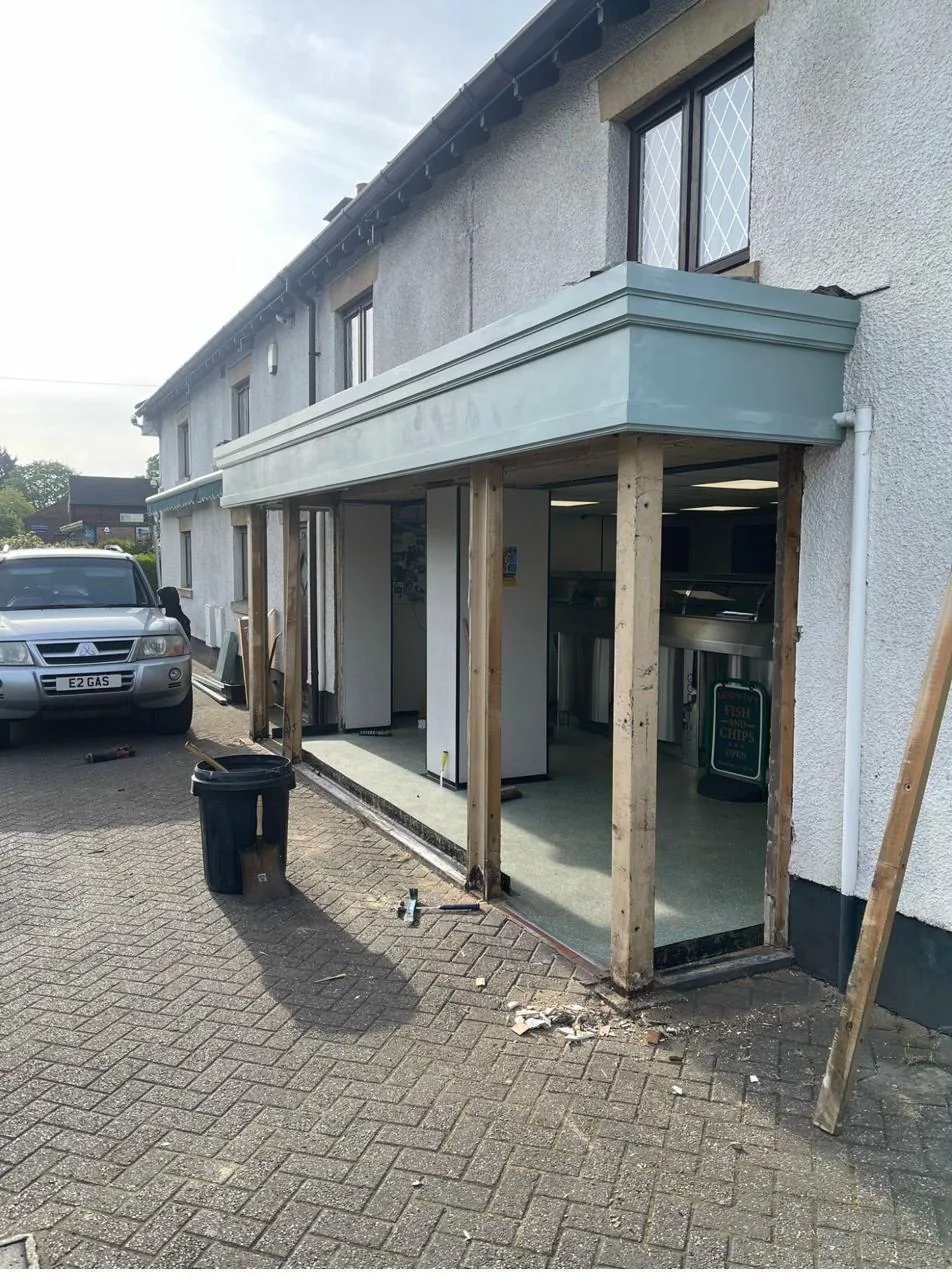 Bespoke painted timber commercial shopfront installation
