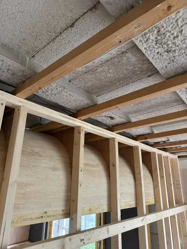 Plywood skin bent over a run of ribs to form a barrel-shaped ceiling section